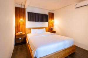 Ένα ή περισσότερα κρεβάτια σε δωμάτιο στο Soho Loft