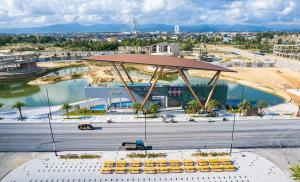 a group of yellow benches in a parking lot at Villa 5 brs Bao Ninh Legend walk street in Dong Hoi
