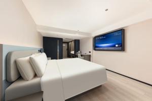 TV o dispositivi per l'intrattenimento presso Atour Light Hotel Xiamen Convention and Exhibition Center Software Park Phase II