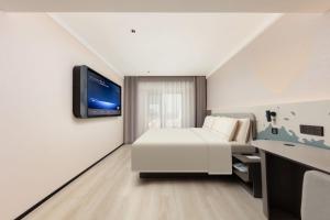 Letto o letti in una camera di Atour Light Hotel Xiamen Convention and Exhibition Center Software Park Phase II
