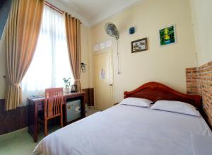 Letto o letti in una camera di Bình Đào Hotel - Khách sạn ngay trung tâm giá rẻ