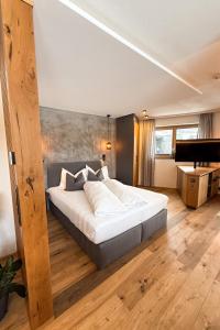 Postel nebo postele na pokoji v ubytování Cabin8 Alpine Flair Apartments