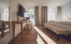 Ένα ή περισσότερα κρεβάτια σε δωμάτιο στο Hotel Joseph's House by Mountain Hotels