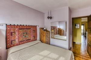 Posteľ alebo postele v izbe v ubytovaní Apt Amarres, piscina comunitaria