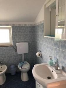 Kúpeľňa v ubytovaní Apartman SARA
