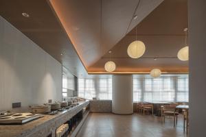 Dapur atau dapur kecil di 桔作酒店 许昌东站胖东来天使城店