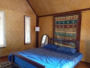 Postel nebo postele na pokoji v ubytování Kiniman Home + 37 fotografií