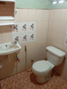 Koupelna v ubytování Kiniman Home