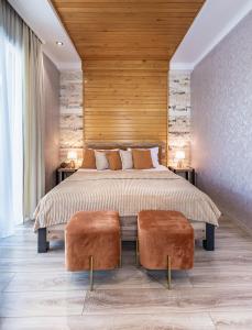 Postel nebo postele na pokoji v ubytování Hotel Gold Tower