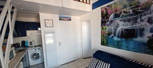 Kuchyň nebo kuchyňský kout v ubytování Appartement MALYA avec vue mer sur ponton de Port Leucate + 10 fotografií