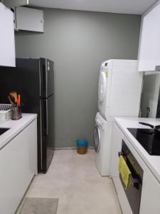 Kuchyň nebo kuchyňský kout v ubytování Vortex Suites KLCC By Farysha