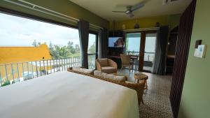Ліжко або ліжка в номері CHiEM HoiAn - The Beachside Boutique Hotel & Villa
