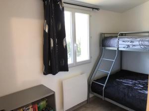 Palanda nebo palandy na pokoji v ubytování Maison de charme