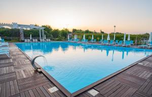 Bazén v ubytování Master Family Club nebo v jeho okolí
