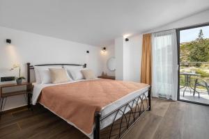 Postel nebo postele na pokoji v ubytování Aiora Luxury Villas