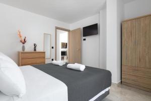 Postel nebo postele na pokoji v ubytování Aiora Luxury Villas