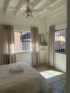 Ένα ή περισσότερα κρεβάτια σε δωμάτιο στο Karlin no 3 Scottburgh Beach