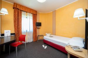 Letto o letti in una camera di Hotel Majorana