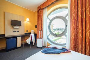 Letto o letti in una camera di Hotel Majorana