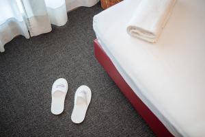 Letto o letti in una camera di Hotel Majorana