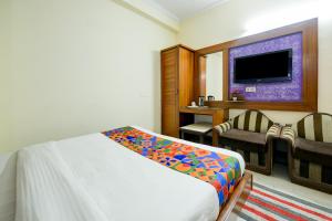 Postel nebo postele na pokoji v ubytování Hotel Paradise - New Delhi