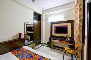 Postel nebo postele na pokoji v ubytování Hotel Paradise - New Delhi