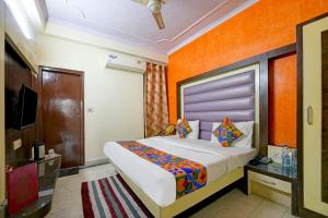 Postel nebo postele na pokoji v ubytování Hotel Paradise - New Delhi