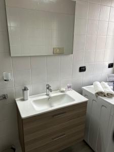Postel nebo postele na pokoji v ubytování Todeschini 27