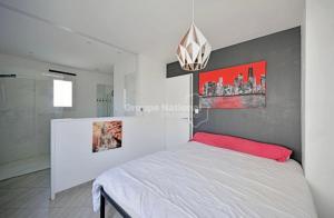 Ένα ή περισσότερα κρεβάτια σε δωμάτιο στο belle maison de vacances climatisée,3ch avec piscine