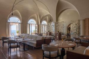 Гостиная зона в Anantara Convento di Amalfi Grand Hotel +37 фотографий