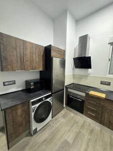 Kuchyň nebo kuchyňský kout v ubytování Apartamento Martina 1