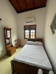 Postel nebo postele na pokoji v ubytování City House