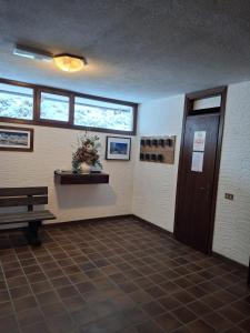 Vstupní hala nebo recepce v ubytování Montasio SELLA NEVEA Condominio Bucaneve TARVISIO ITALY