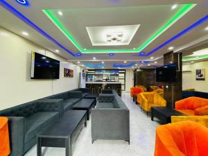 Posezení v ubytování Mainspring Home and Suite Ltd