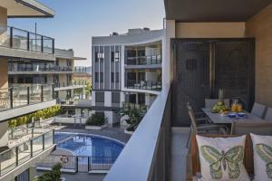 an image of an apartment balcony with a swimming pool at Nova Essential in Jávea