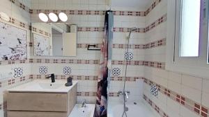 a bathroom with a sink and a shower at For Sea Lovers in Cubelles +7 photos