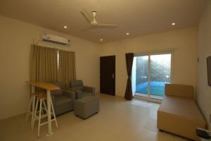 Posezení v ubytování Lazo Avarta Resort and Convention Centre Pondicherry