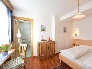 Postel nebo postele na pokoji v ubytování Residence Salvan