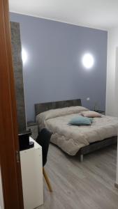 Postel nebo postele na pokoji v ubytování Podere Monfalcone guest house