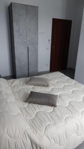Postel nebo postele na pokoji v ubytování Podere Monfalcone guest house