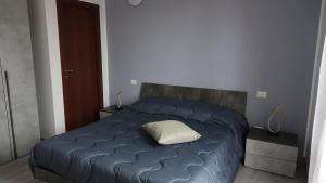 Postel nebo postele na pokoji v ubytování Podere Monfalcone guest house