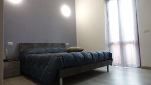 Postel nebo postele na pokoji v ubytování Podere Monfalcone guest house