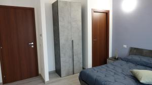 Postel nebo postele na pokoji v ubytování Podere Monfalcone guest house