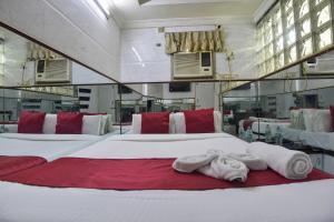 Postel nebo postele na pokoji v ubytování Sun Guest House