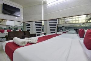 Postel nebo postele na pokoji v ubytování Sun Guest House