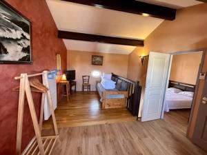 a room with a bedroom with two beds and a door at Mais 2 pièces mezza CHATELAILLON PLAGE - CL080-022 in Châtelaillon-Plage
