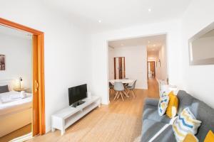 Televízia a/alebo spoločenská miestnosť v ubytovaní 42ara1026 - Spacious apartment in Eixample