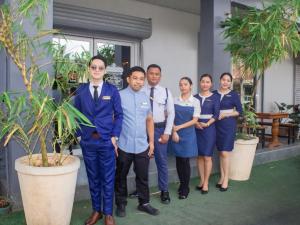 Členové personálu v ubytování Gmb-Arte' Hotel