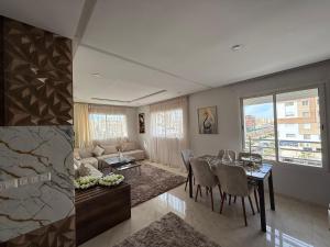 Posezení v ubytování Superbe appartement avec Netflix et Iptv