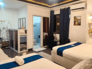 Postel nebo postele na pokoji v ubytování Gmb-Arte' Hotel